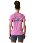 The back of the Patagonia capilene cool daily graphic tshirt in 73 skyline brisk purple available at Babipur. A short sleeve top in bright purple with a large brand graphic. 