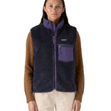 A model wearing the Patagonia womens classic retro x fleece vest available at Babipur showing the front fit of the gilet