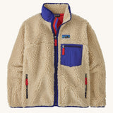 A Patagonia women's classic retro-x jacket in a dark natural colour way available at Babipur. A thick fleece with royal blue trim detail with a full length zip, 2 side pockets and a chest pocket with the logo patch stitched above.