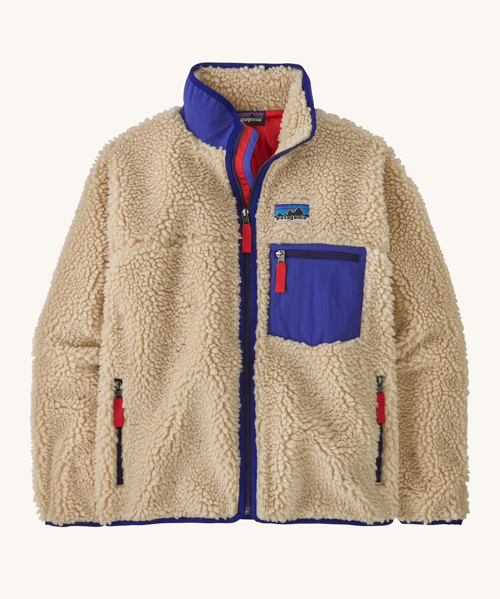A Patagonia women's classic retro-x jacket in a dark natural colour way available at Babipur. A thick fleece with royal blue trim detail with a full length zip, 2 side pockets and a chest pocket with the logo patch stitched above.