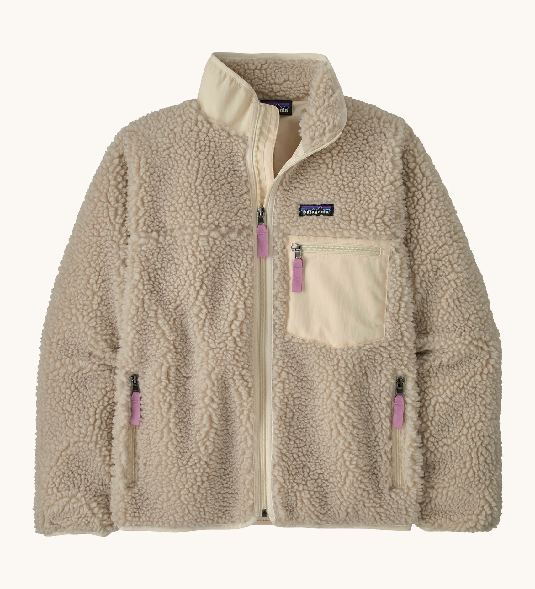 Patagonia women's classic retro x jacket in cream. Shows a full length zip, zipperd side and chest pockets with light pink tabs