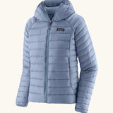 Patagonia women's down insulated sweater hoody in barnacle blue. Features a full length zip and side pockets