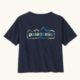 Patagonia women's unity Fitz roy responsibili tshirt. A navy blue, short sleeved and boxy top with the brand logo printed on the back. 