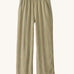Patagonia women's garden island light weight pants in light brown. Shows 2 front pockets and a elasticated waist band