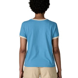 Back of woman wearing Patagonia women's great waves ringer t-shirt in light blue. Shows a white trim around the arms and collar