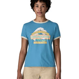 Woman wearing Patagonia women's great waves ringer t-shirt in light blue with a wave logo on the upper body.