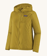 Patagonia light rain hooded jacket in mustard yellow. Features a full length zip and chest pocket