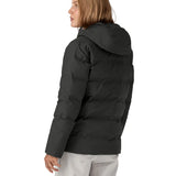 Back of woman wearing Patagonia's Jackson glacier hooded jacket in black. Jacket has a relaxed fit and sits at the hips