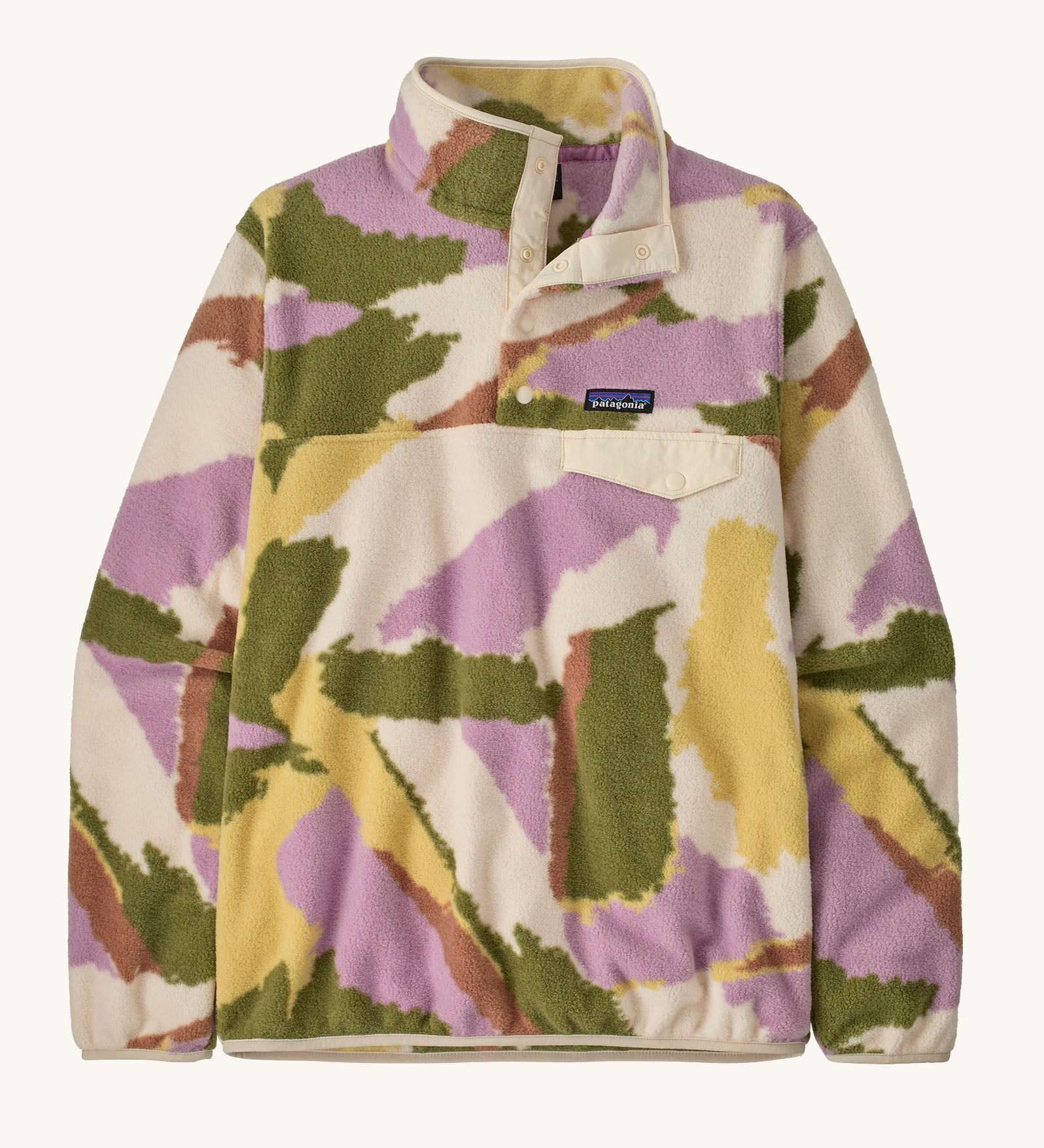 Patagonia women's synchilla snap t fleece in cream with pastel abstract design. Shows 1/4 length front popper up to the collar and chest pocket