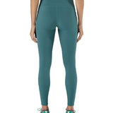 A model wearing the Patagonia women's leggings in wetland blue available at Babipur showing the back fit of the leggings