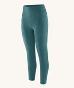 Patagonia women's leggings in wetland blue available at Babipur. A dark green coloured pair pf leggings with side pockets