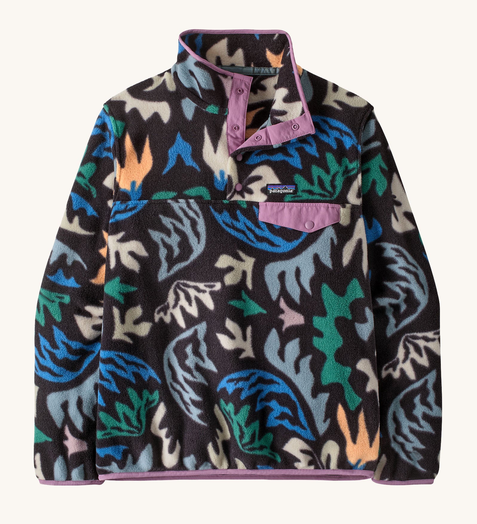 Patagonia women's synchilla snap t fleece in black with a retro abstract design. Shows a 1/4 length front popper up to the collar and a chest pocket