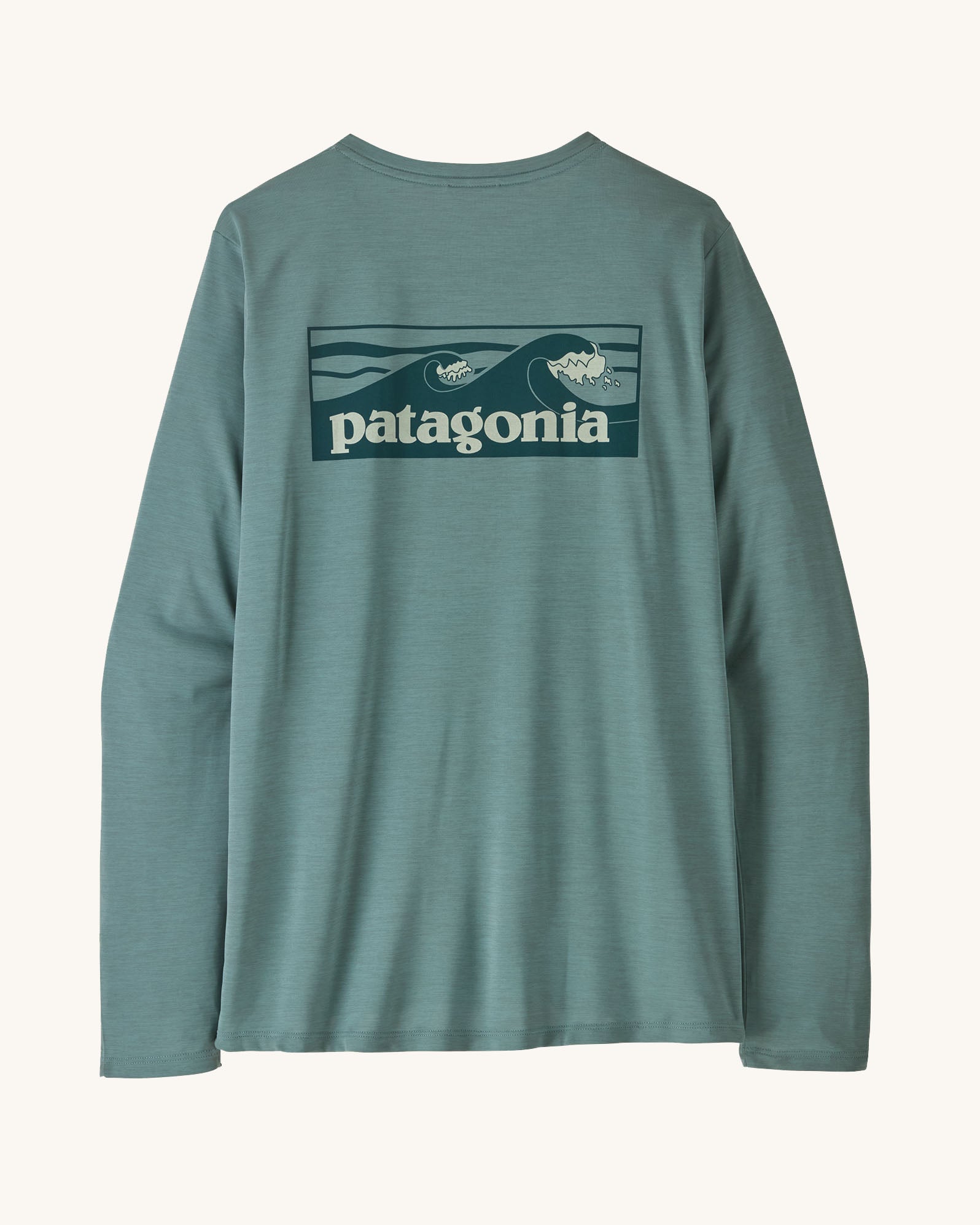Patagonia women's long sleeve capilene cool t-shirt in sage blue with wave logo graphic on upper back