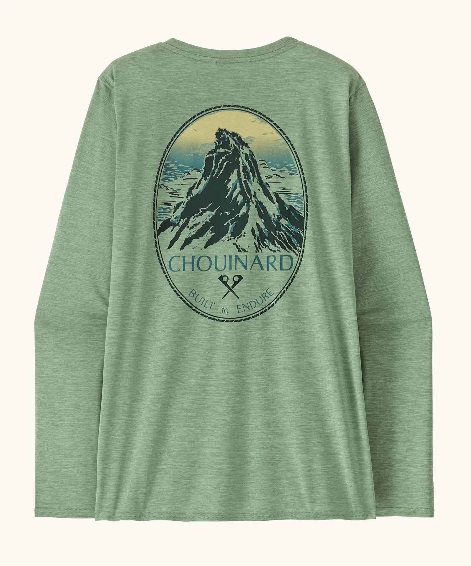 Patagonia women's long sleeve capilene top in light green with Chouniard crest design on upper back