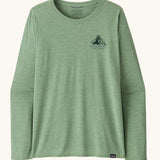 Patagonia women's long sleeve capilene techincal top in light green with mountain logo on the upper chest