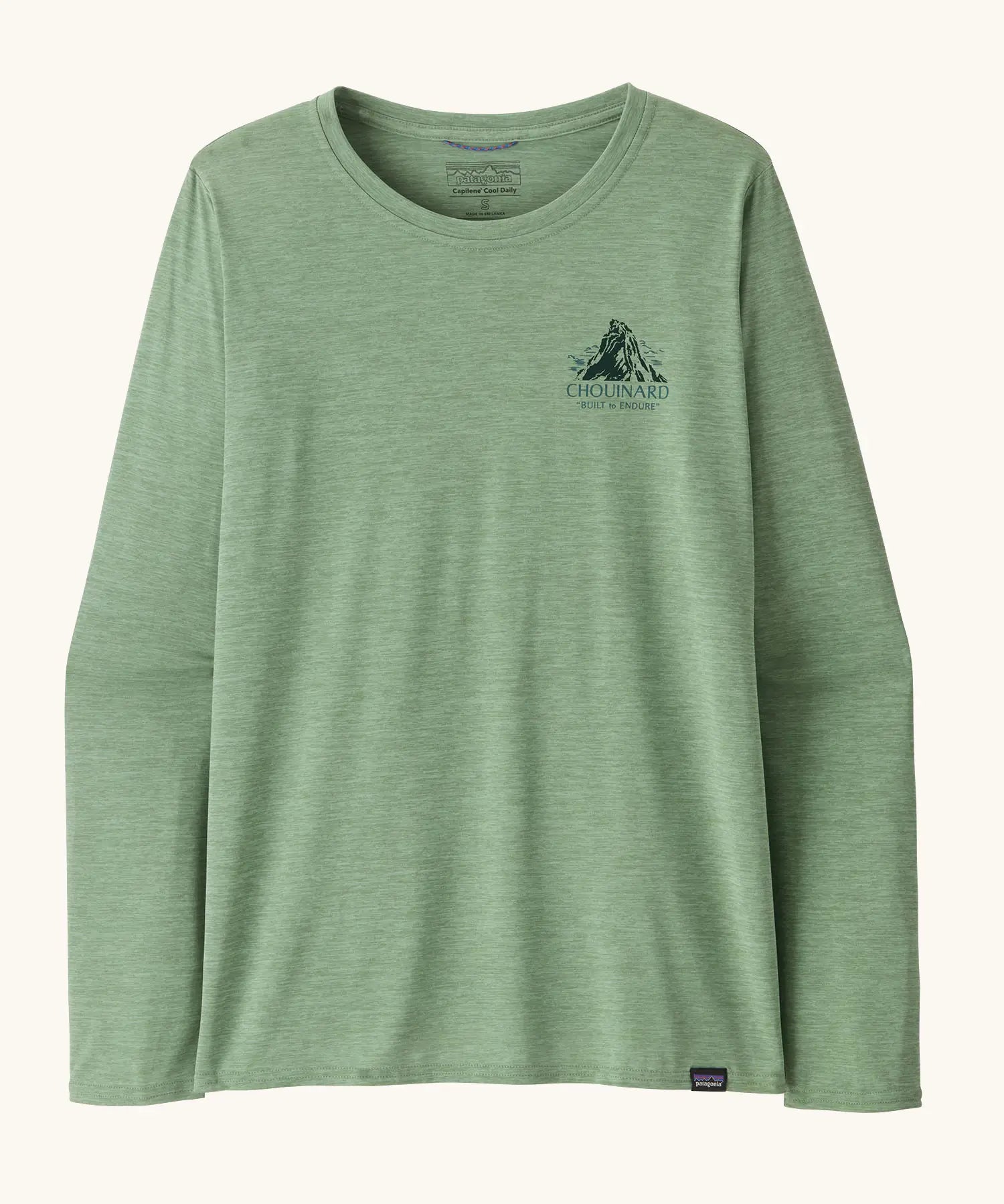 Patagonia women's long sleeve capilene techincal top in light green with mountain logo on the upper chest