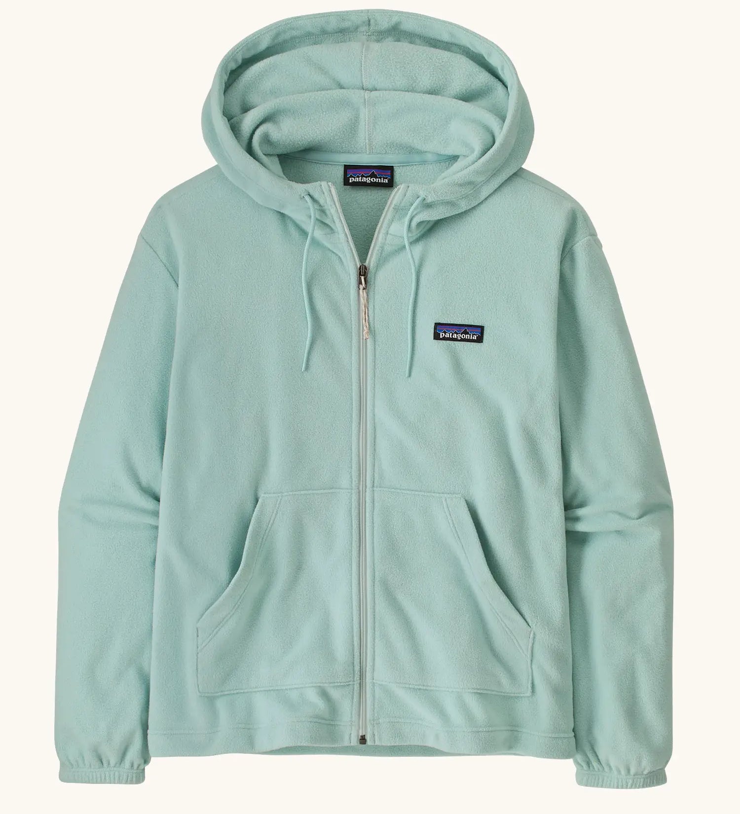 Patagonia women's micro d hooded fleece in pastel blue. Shows a full length front zip, pouch pockets and drawstring cord around the hood.