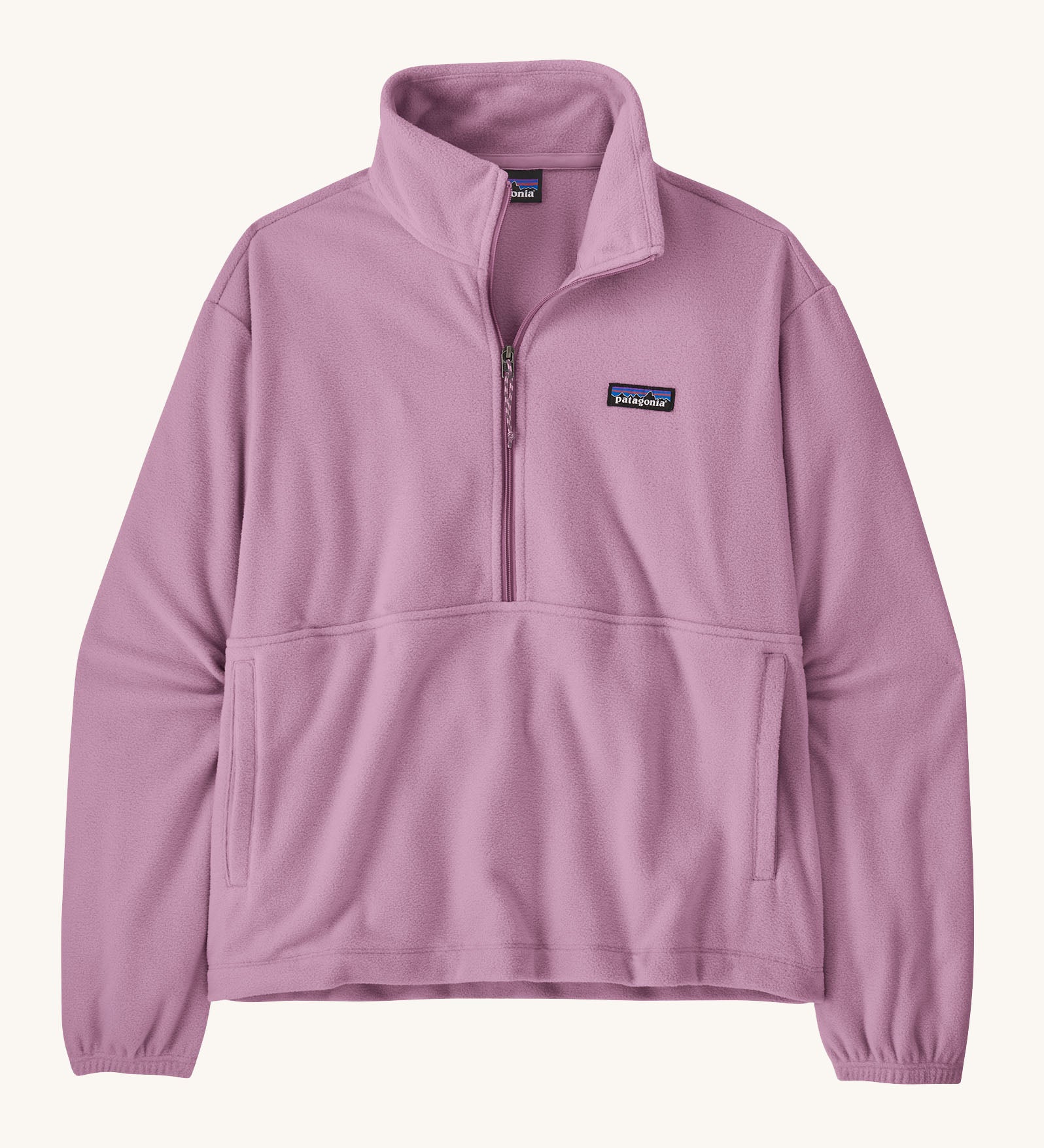 Patagonia women's micro d fleece in light purple with a half length front zip and side pockets