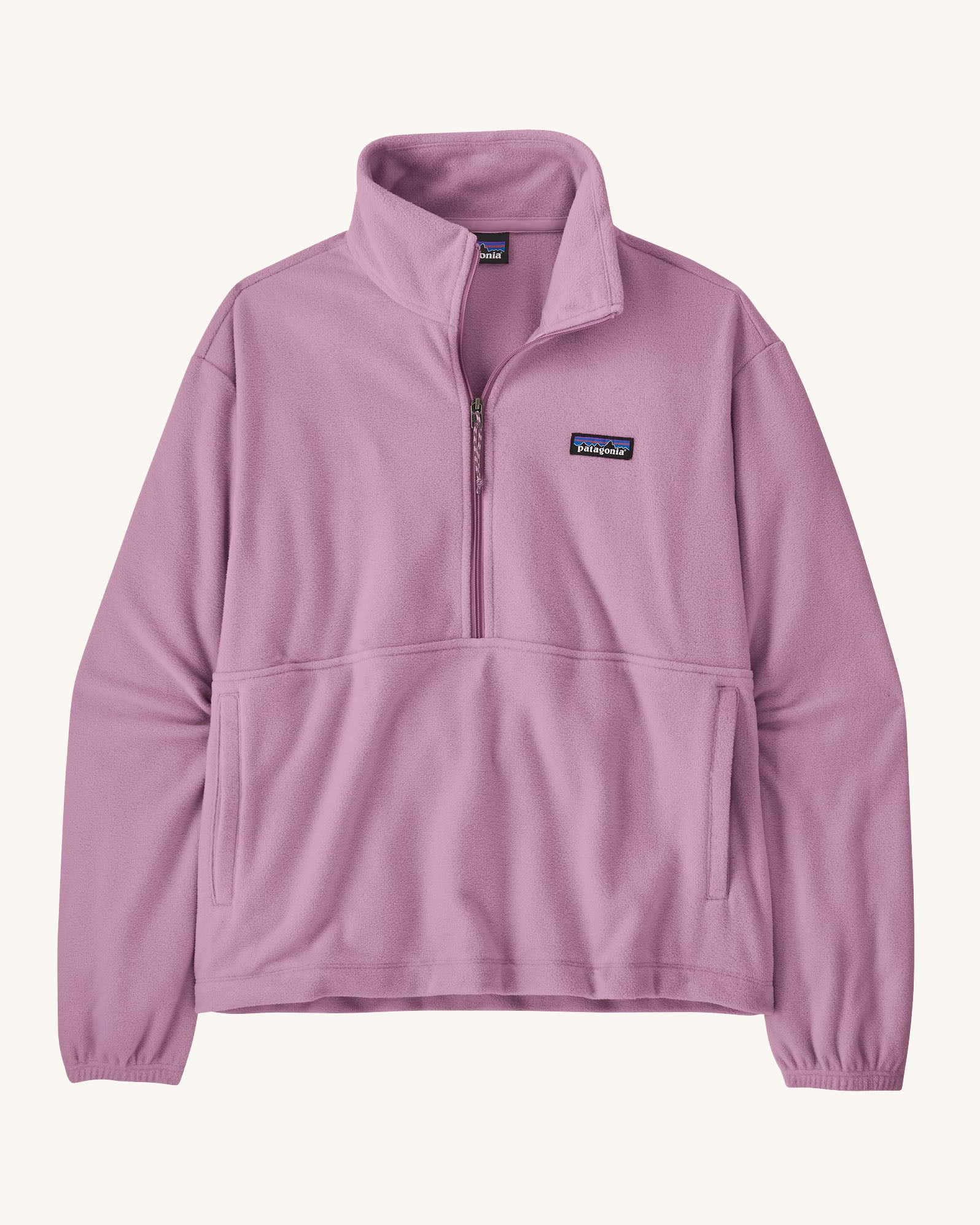 Patagonia women's micro d fleece in light purple with a half length front zip and side pockets