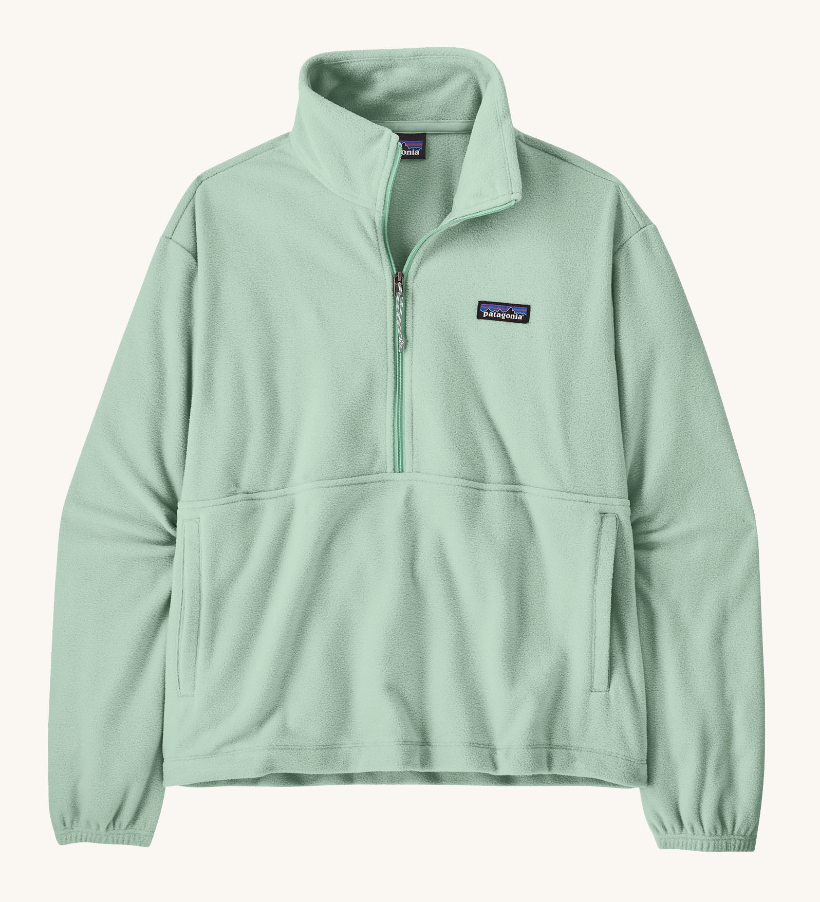 Patagonia women's micro d fleece in mint green with a half length front zip and side pockets