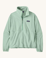 Patagonia women's micro d fleece in mint green with a half length front zip and side pockets
