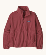 Patagonia women's micro d 1/2 zip fleece in sequoia red available at Babipur. A gentle red fleece with a half zip, turned up collar and side pockets
