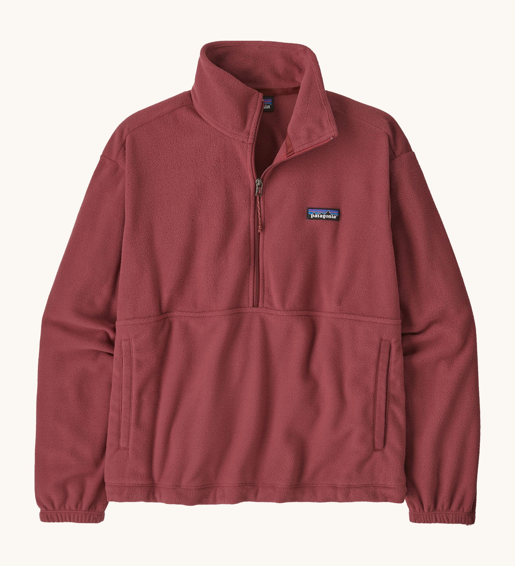 Patagonia women's micro d 1/2 zip fleece in sequoia red available at Babipur. A gentle red fleece with a half zip, turned up collar and side pockets