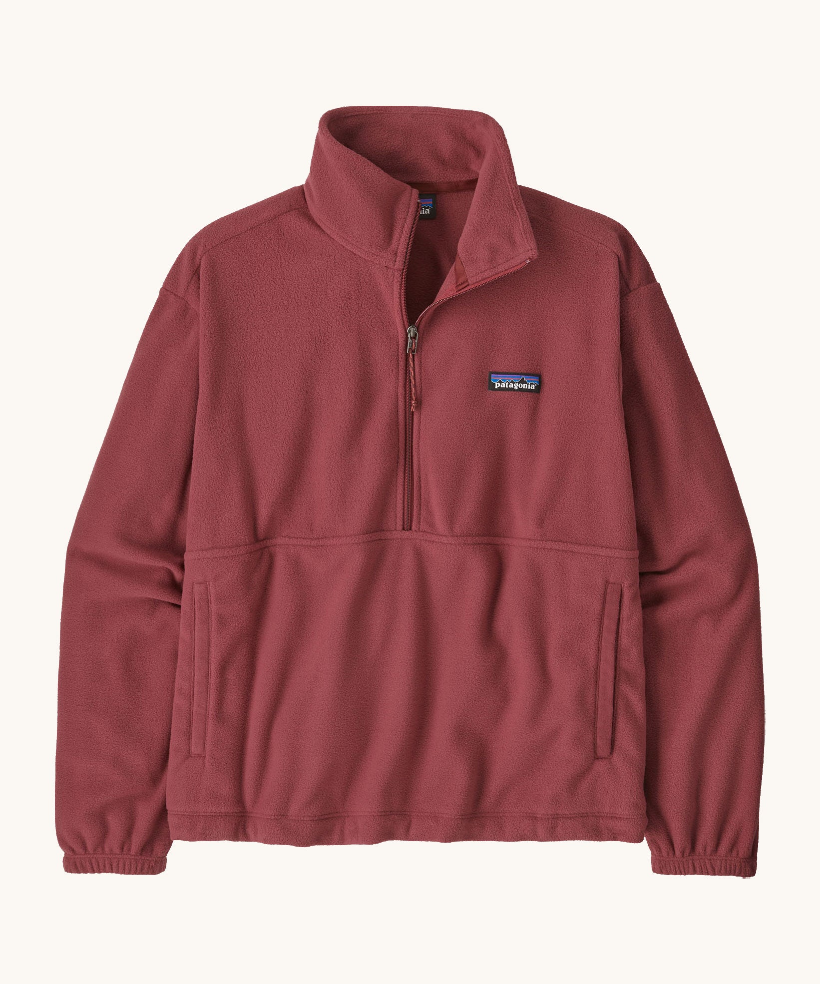 Patagonia women's micro d 1/2 zip fleece in sequoia red available at Babipur. A gentle red fleece with a half zip, turned up collar and side pockets