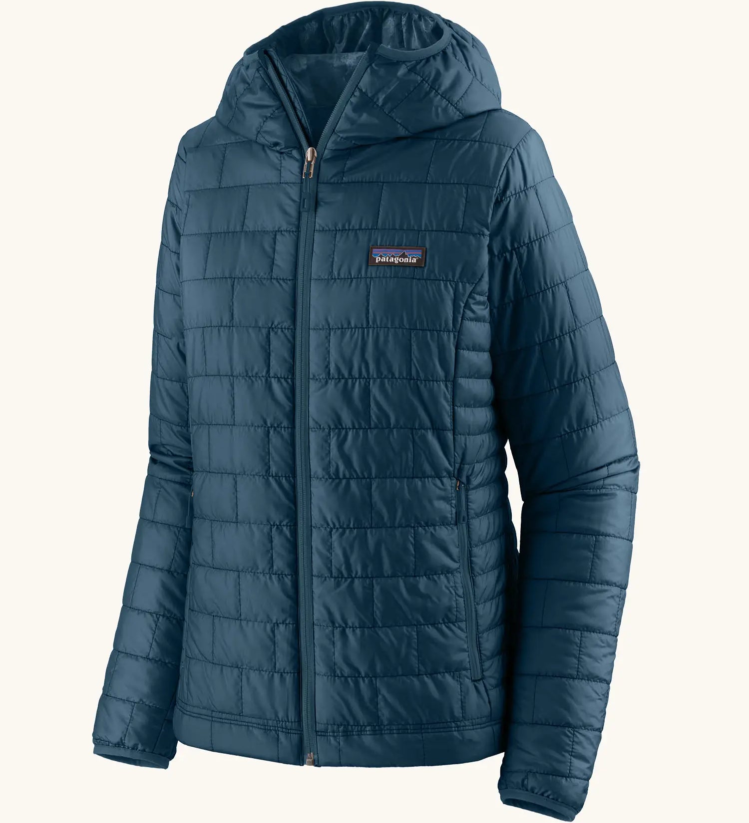 Patagonia women's nano puff hoody in a lagom blue. Features a full length zip and side pockets 