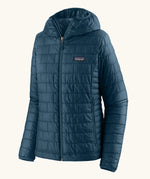 Patagonia women's nano puff hoody in a lagom blue. Features a full length zip and side pockets 