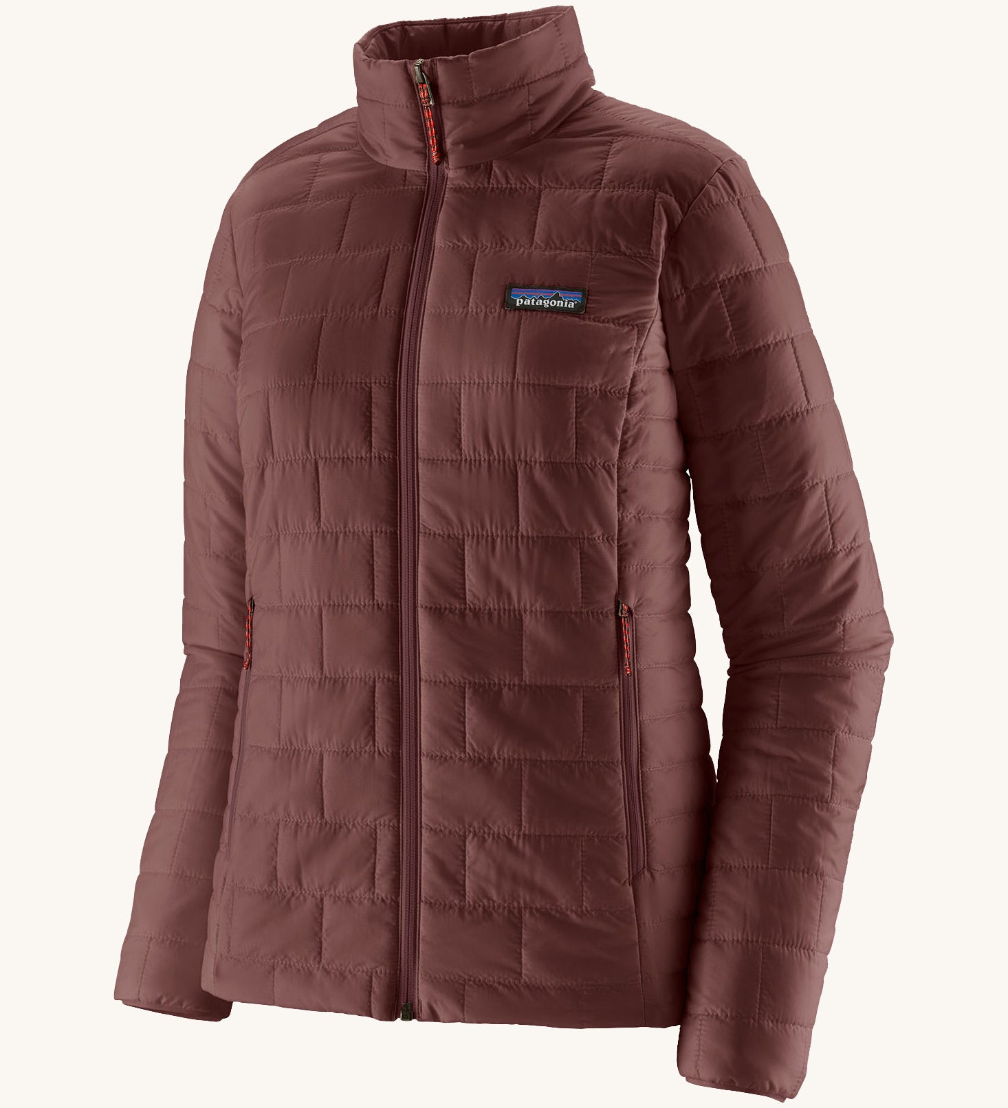 The front of the Patagonia women's nano puff jacket in dark ruby. A dark red jacket with rectangular puffer panels. Jacket features a full length zip and side pockets