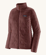 The front of the Patagonia women's nano puff jacket in dark ruby. A dark red jacket with rectangular puffer panels. Jacket features a full length zip and side pockets