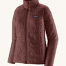The front of the Patagonia women's nano puff jacket in dark ruby. A dark red jacket with rectangular puffer panels. Jacket features a full length zip and side pockets