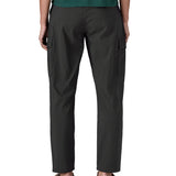 The back of the female standing in front of a white background wearing sandals and the Patagonia women's lightweight cargo trousers in black showing the leg length of the trousers