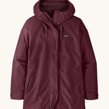 Patagonia women's outdoor everyday rain jacket in maroon. Features a full length zip and popper fastener, side pockets and adjustable hood