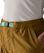Close up of Patagonia women's outdoor everyday quick drying shorts in brown showing light green belt.