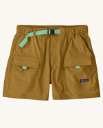 Patagonia women's outdoor everyday quick drying shorts in light brown. Shows side and front pockets and green belt.
