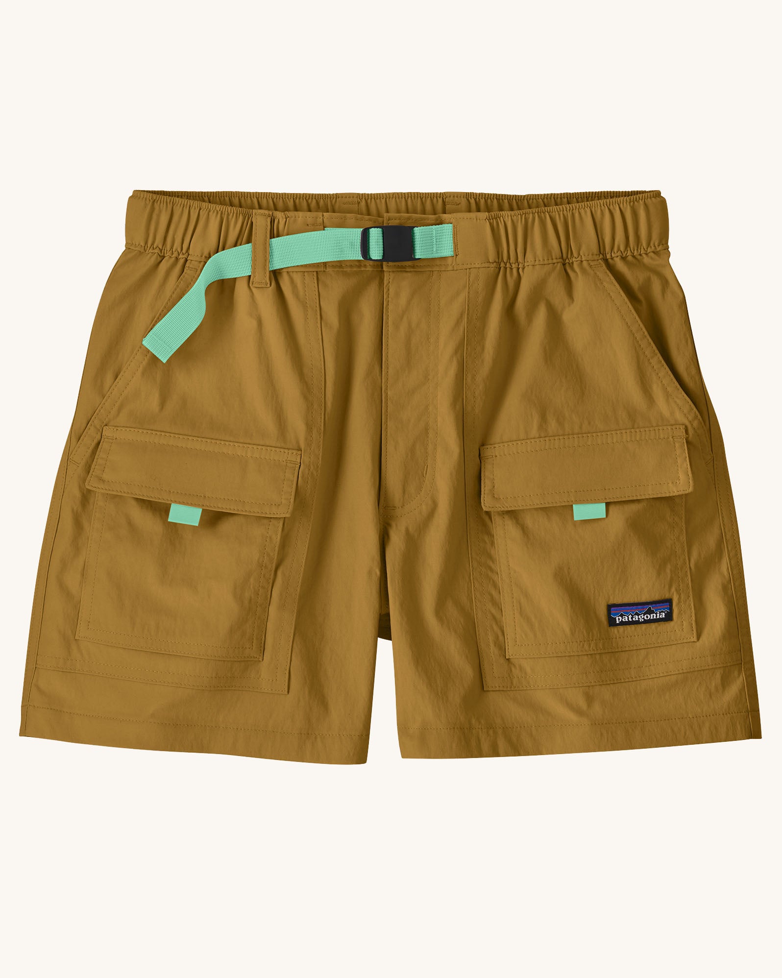 Patagonia women's outdoor everyday quick drying shorts in light brown. Shows side and front pockets and green belt.