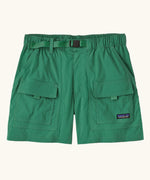 Patagonia women's outdoor everyday quick drying shorts in green. Shows side and front pockets and matching green belt.