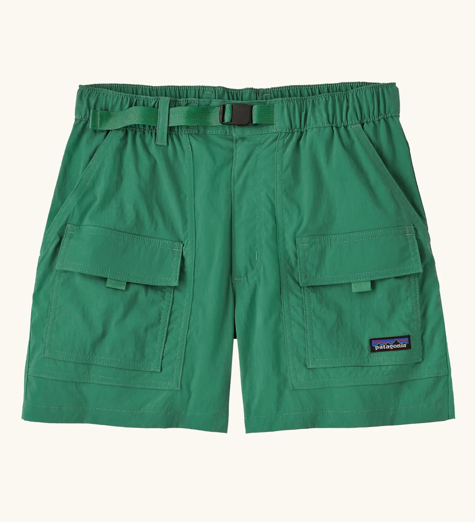 Patagonia women's outdoor everyday quick drying shorts in green. Shows side and front pockets and matching green belt.