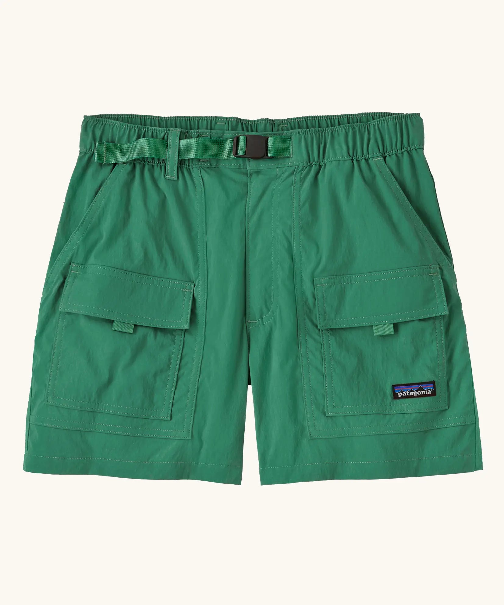 Patagonia women's outdoor everyday quick drying shorts in green. Shows side and front pockets and matching green belt.