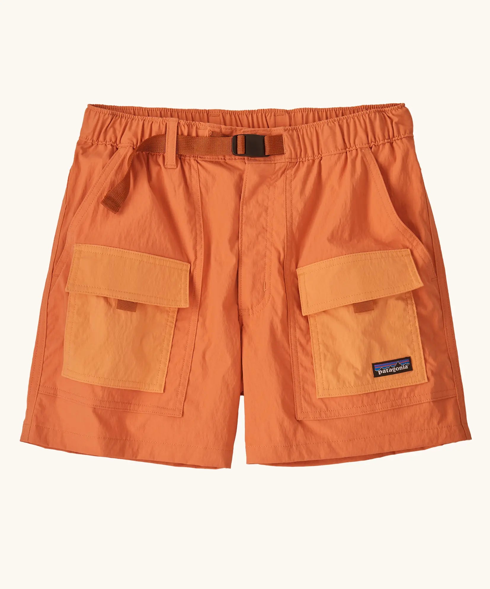 Patagonia women's outdoor everyday quick drying shorts in orange with contrast front pockets. Features side pockets and matching orange belt