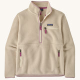 Patagonia women's thick fleece jacket in light cream. Features a half length front zip with side and chest pockets.