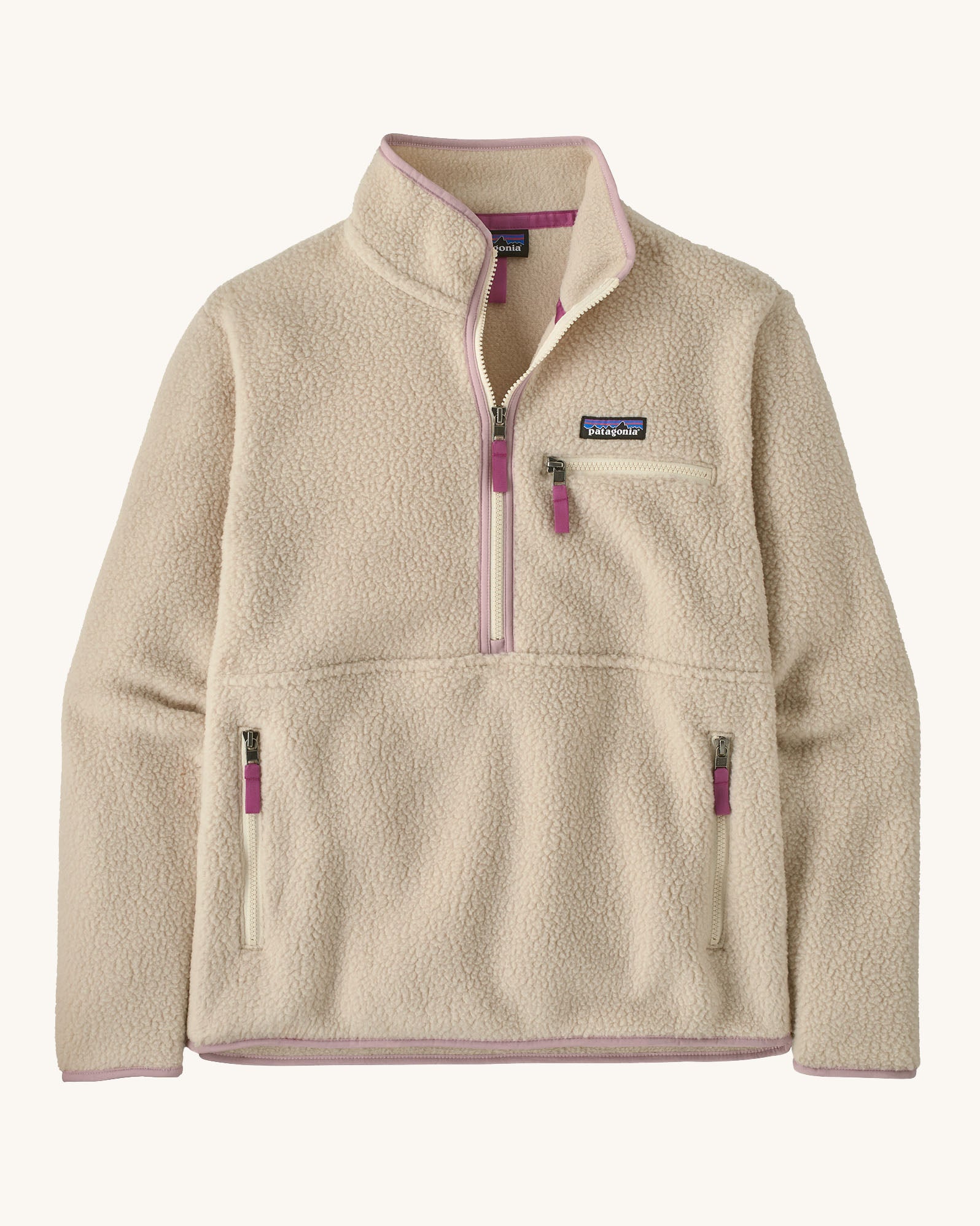 Patagonia women's thick fleece jacket in light cream. Features a half length front zip with side and chest pockets.