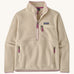 Patagonia women's thick fleece jacket in light cream. Features a half length front zip with side and chest pockets.