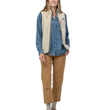 A model wearing the Patagonia womens retro pile vest in pelican available at Babipur showing the front fit of the gilet with the zip open