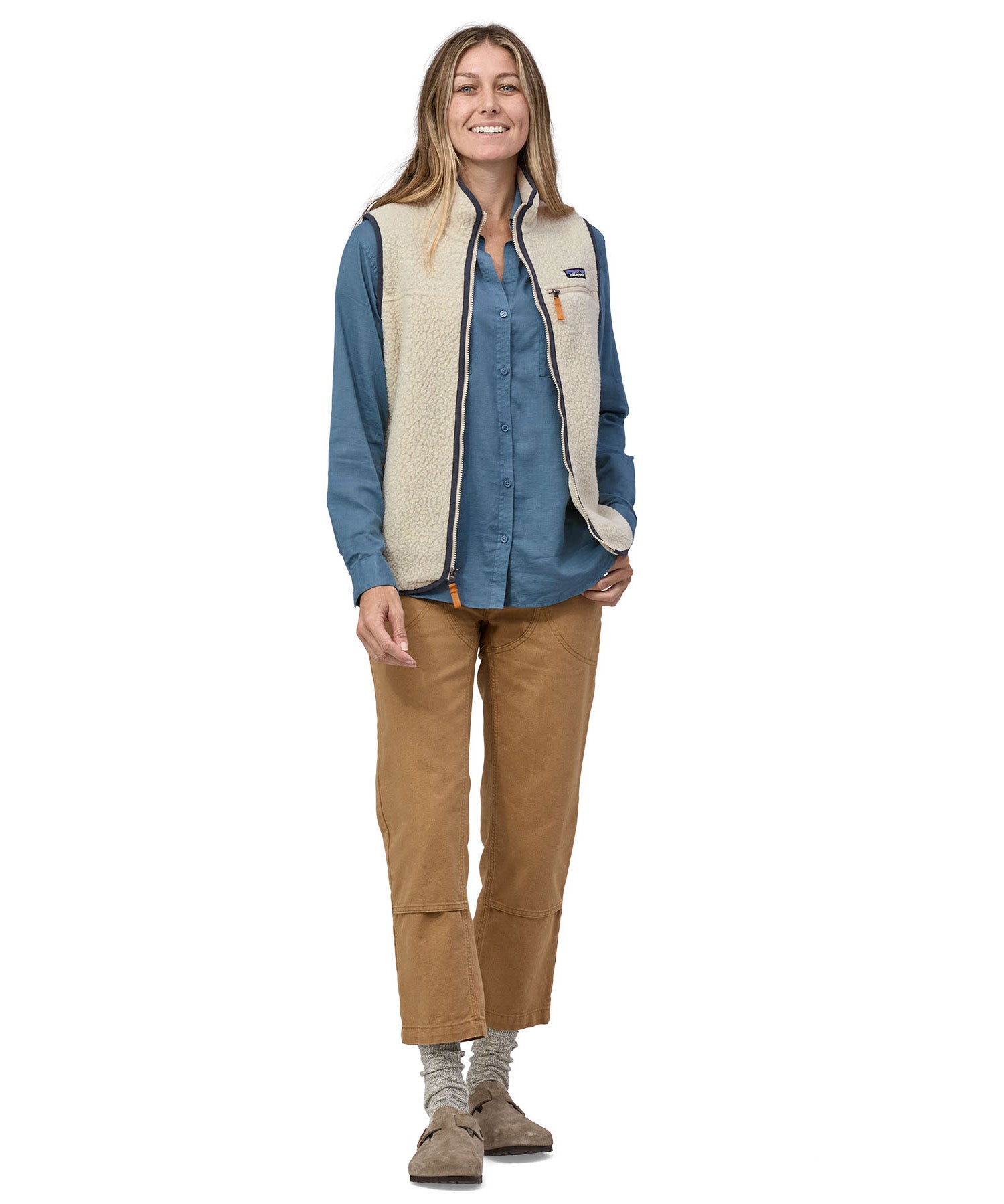 A model wearing the Patagonia womens retro pile vest in pelican available at Babipur showing the front fit of the gilet with the zip open