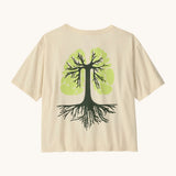 Patagonia women's easy cut short sleeve t-shirt in cream with green tree roots graphic on the back
