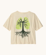 Patagonia women's easy cut short sleeve t-shirt in cream with green tree roots graphic on the back
