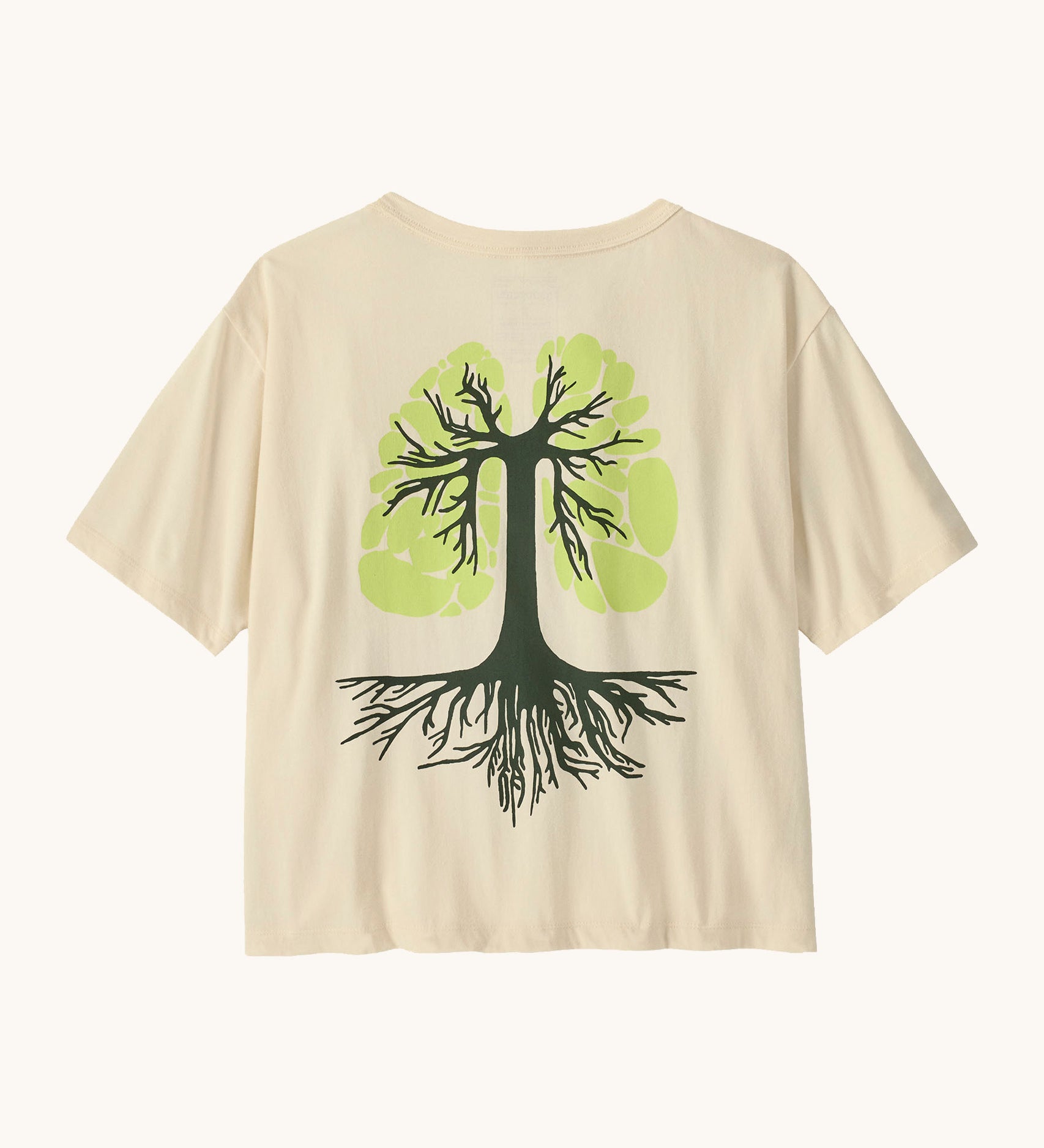 Patagonia women's easy cut short sleeve t-shirt in cream with green tree roots graphic on the back